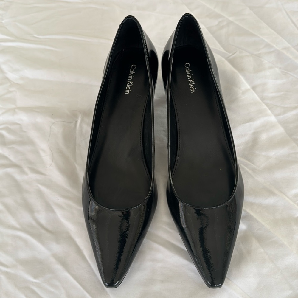 Calvin Klein, black patent leather, 1.5 inches pump size 9- NWOT.